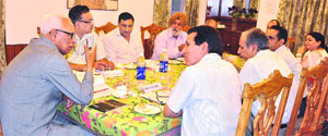 Governor NN Vohra attends a meeting at Raj Bhawan on Tuesday.