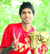 Abhinav Manota with the trophy he won in the Punjab State Badminton Championship at the Hans Raj Stadium in Jalandhar.