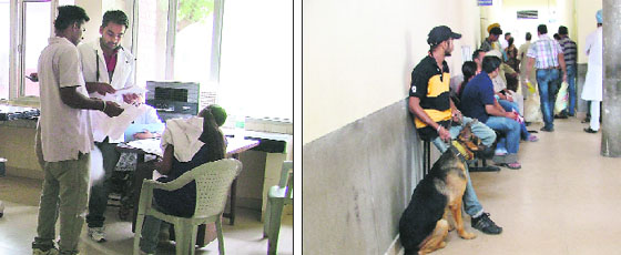 Students prescribe medicines at a clinic at Guru Angad Dev Veterinary and Animal Sciences University; and (right) pet owners wait for veterinarians outside the clinic.