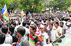 MNS chief Raj Thackerays supporters hold a march from Girgaum Chowpatty to Azad Maidan in Mumbai on Tuesday.