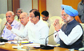 Prime Minister Manmohan Singh chairs an all-party meeting in New Delhi on Tuesday.