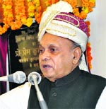 Chief Minister PK Dhumal addresses the gathering after inaugurating a forest rest house at Chabutra in Hamirpur on Wednesday. A Tribune photograph