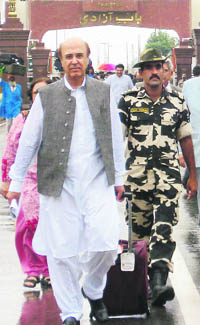 Members of a delegation from Pakistan arrive at the Attari border on Wednesday. 