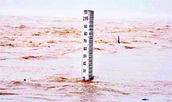 Ganga waters close to the danger mark in Haridwar on Thursday. Tribune photo: Rajeshwar Gaur