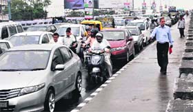 A view of a traffic jam due to heavy rains at Ajrodha chowk in Faridabad