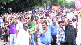 Members of the United Forum of Bank Unions take out a protest in Jalandhar on Thursday