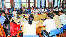 Foreign affairs expert Walter Rusell Mead interacts with students and faculty at the University of Kashmir on Thursday