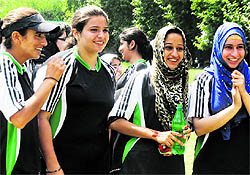 Girls root for their team during a match on the opening day of the Federation Cup Throwball Championship 2012 at the sports ground of the Government College for Women, Srinagar