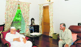 Former state Governor Sudarshan Aggarwal meets Governor Aziz Qureshi in Dehradun on Friday.