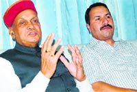 Chief Minister PK Dhumal addresses mediapersons in Dharamsala on Friday. Photo: Kamaljeet