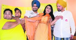 Star cast of Raula Pai Gaya poses for a photograph in Ludhiana on Friday. Tribune photo: himanshu mahajan