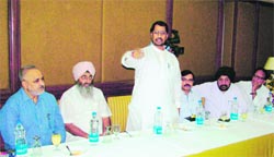 Industry minister Anil Joshi holds a meeting with traders in Amritsar on Saturday. photo: vishal kumar