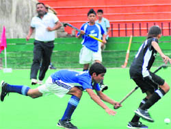 Players in action during the 11th SN Vohra U-14 Hockey Tournament at Sector 42 in Chandigarh on Saturday.