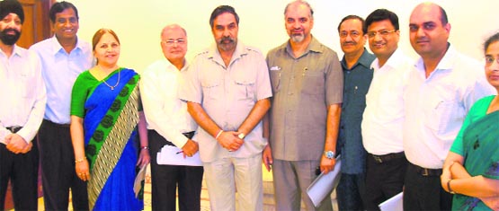 A delegation of the CII meets Union Minister of Commerce, Industry and Textile Anand Sharma in Dehradun on Saturday. A Tribune photograph