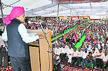 CM PK Dhumal addresses a rally in Baddi on Saturday