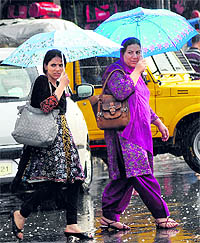 Showers lashed Srinagar city on Saturday, bringing respite for people from the heat wave