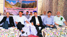 (From left) Minister of State for Home Nasir Sogami and Minister of Tourism and Culture Nawang Rigzin Jora during a function to promote tourism at Kokarnag on Saturday.