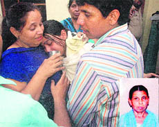 Relatives of Nirmala (inset) grieve over her death in Ludhiana on Saturday. 