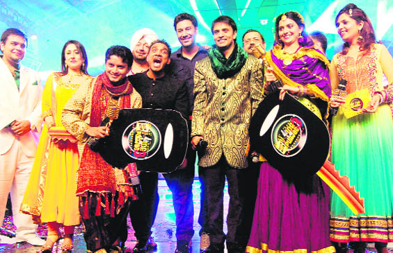 The winners of Voice of Punjab 3 contest held in Amritsar on Saturday night. 