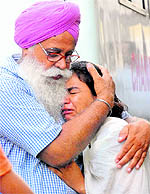 Wailing relatives of Pritam Kaur (right) at her Sector 41 residence in Chandigarh