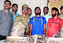 The accused in the Sai Baba Temple theft case in police custody in Dehradun on Sunday