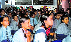 Students participate in the Children's Literature Festival in Dehradun on Sunday