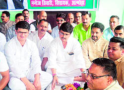 Congress MLA from Almora Manoj Tewari, along with other party leaders, stages a protest at Almora on Sunday