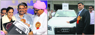 Bhupinder Singh Hooda, CM, honours London Olympics badminton bronze medallist Saina Nehwal at a samman samaroh at Gohana in Sonepat on Sunday; and (right) silver medallist shooter Gagan Narang poses with his Audi car gifted at the function.