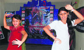 Youths perform during the semi final of Talaash-e-Hunnnerin Jammu on Sunday.