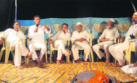 Experts respond to quieries of youths during Eid Milan in Doda on Saturday.