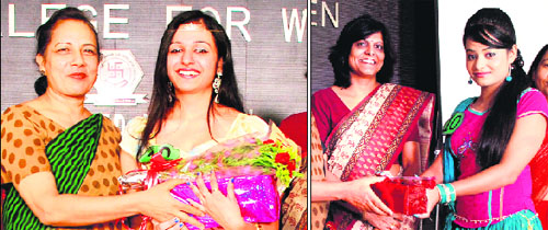 Winners of a beauty contest receive award from teachers at SD College in Jalandhar.