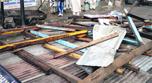 Tin sheets dislodged by the windstorm in Handwara on late Saturday night.