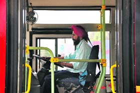 A driver of a low-floor bus without a uniform