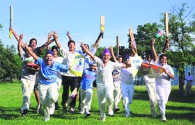 Cricket fans celebrate the Indian team’s victory in Ludhiana on Sunday