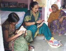 Women busy doing embroidery on juttis in Fazilka.