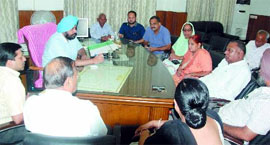 Mayor Baljit Singh Birbehman chairs a meeting of the MCB panel.