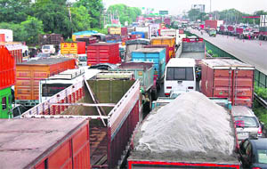 A view of a traffic jam at Khidki Daula on the National Highway No. 8 in Gurgaon on Monday. 