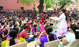 Dr Saanvi Sihag, a dental surgeon from Sirsa, addresses girls at Government National PG College at Sirsa.