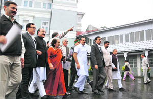 CLP leader Vidya Stokes and other MLAs walk out of the Vidhan Sabha in Shimla on Monday. 