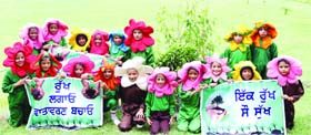 For a green tomorrow: Students of St Soldier school during a plantation drive in Jalandhar