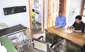 Dr Harish Bhardwaj checks a patient at the dispensary Jalandhar