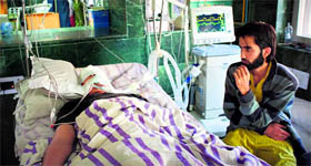 A file photo of Fida Nabi, a class XII student, who was fired upon by security forces on August 3 during the 2010 unrest. He died five days later.