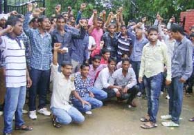 Students of the Government College, Muktsar, block the Kotkapura-Muktsar road on Tuesday