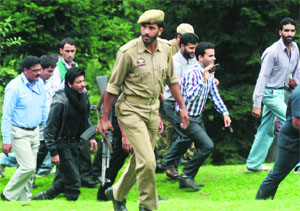 Shah Rukh Khan walks amids heavy security to shoot for an untitled film at Pahalgam in south Kashmir.