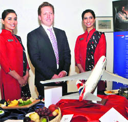 Christopher Fordyce,commercial manager (South Asia),  British Airways with airhostesses at the relaunch of British Airwayss Catering Service for India at a press conference in New Delhi on Wednesday. 