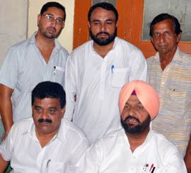 Local Congress leaders lead by former MLA Harminder Singh Jassi held a press conference on Wednesday to decry the move by the SAD-BJP government in the state to levy fresh taxes. 