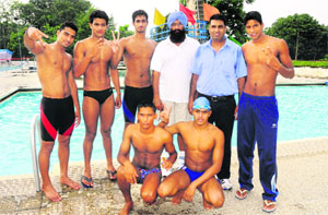 DAV College students after winning the swimming competition held at Panjab University in Chandigarh on Wednesday