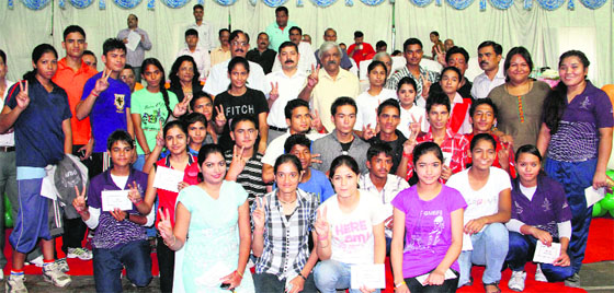 Sportspersons who were given medals and certificates in Dehradun on Wednesday.