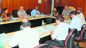 Chief Minister Vijay Bahuguna chairing a meeting of Peyjal Nigam and the Finance Department in Dehradun on Wednesday. 