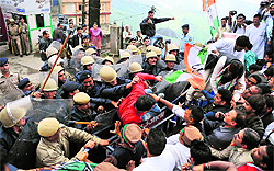 Congress supporters scuffle with the police in Shimla on Wednesday